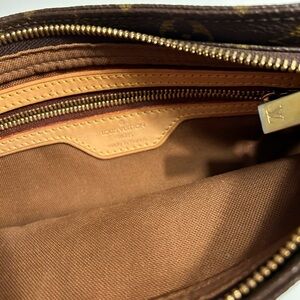 Louis Vuitton cross zippered purse